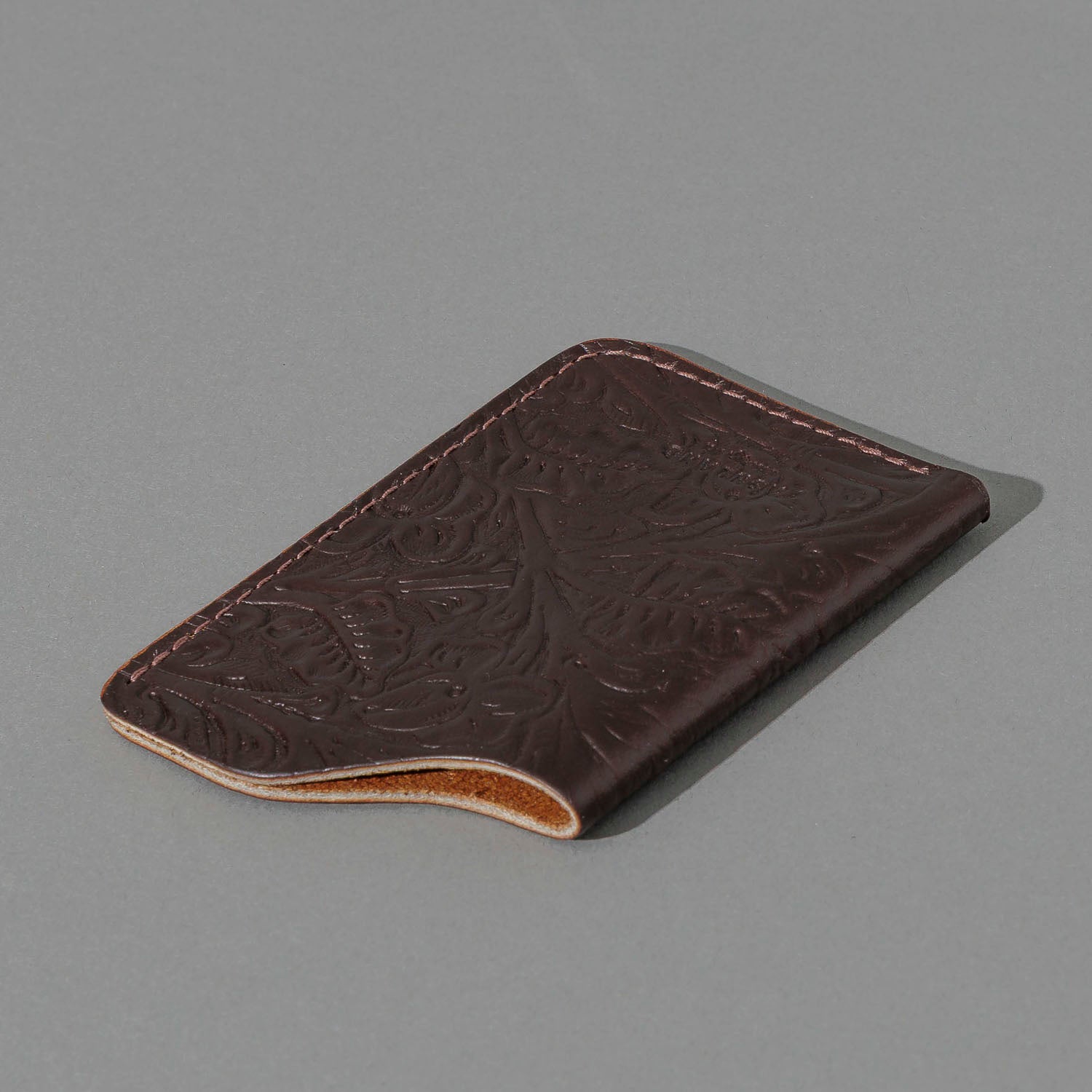 One-Shot Card Case in Western Brown Chromexcel®, angled view lying flat