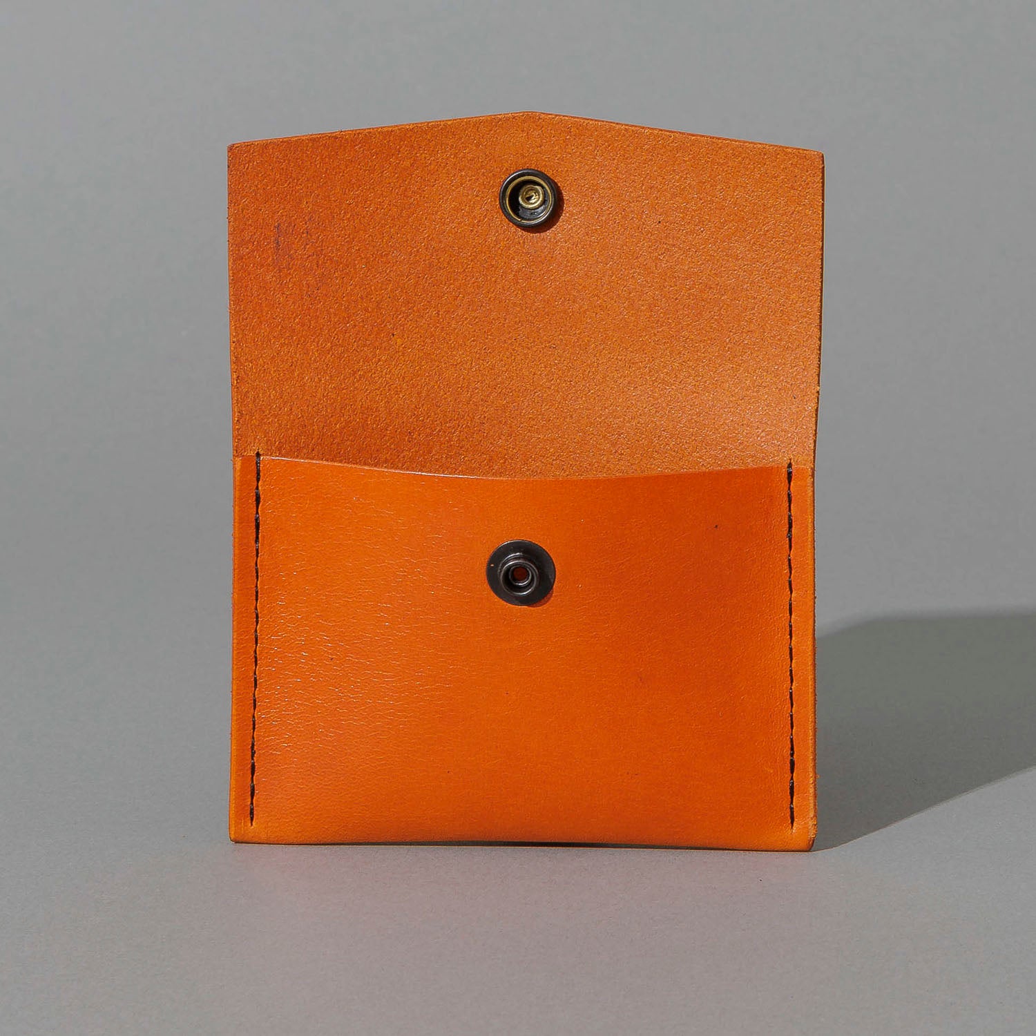 Vic Snap Wallet in Orange Latigo, with flap open