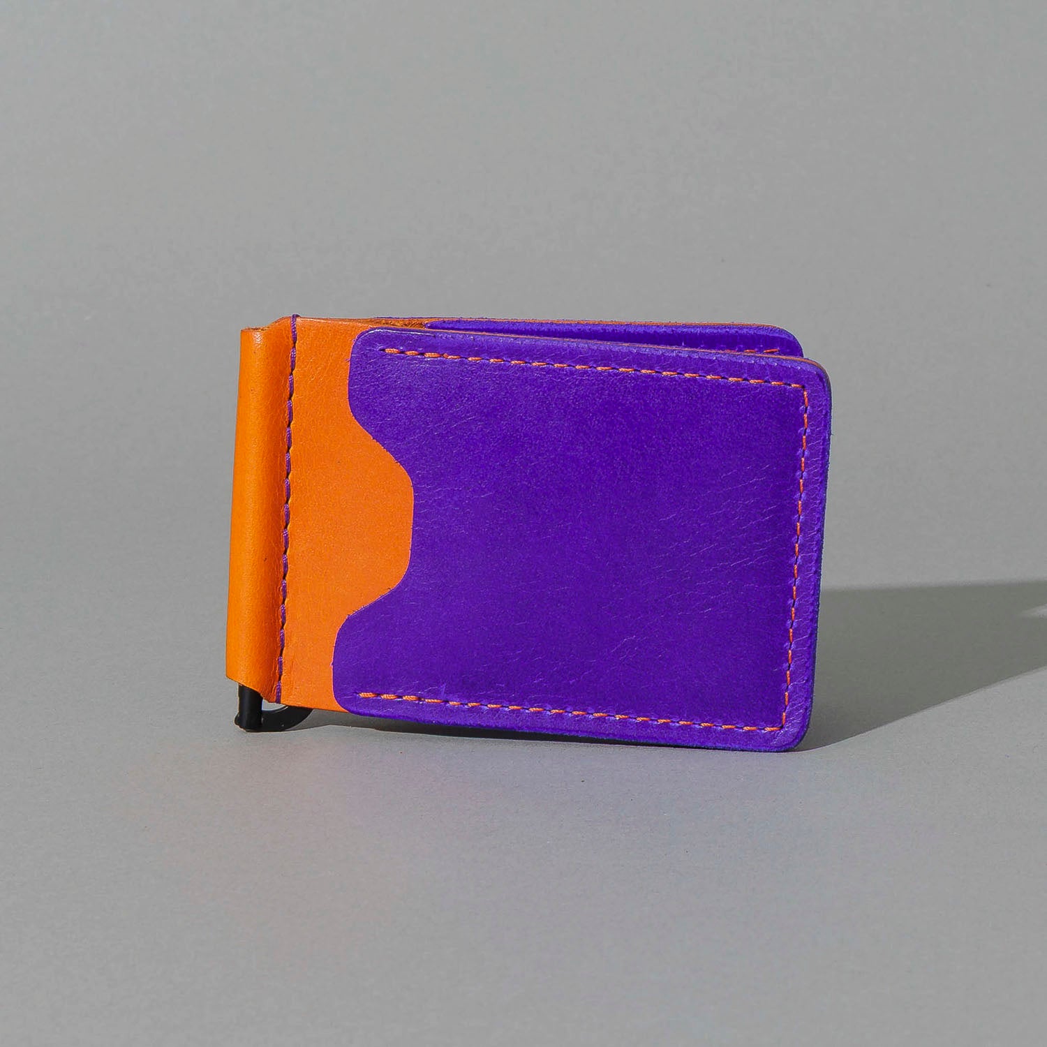 One-Off Capone Money Clip in Violet on Orange Latigo, front view, shot 1