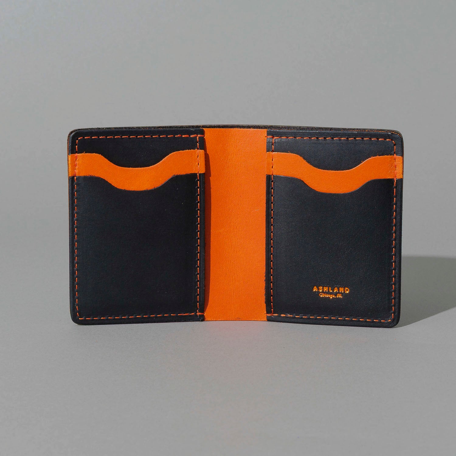 Tall Vertical Tony in Black Dublin with Orange Accents, open, showing interior