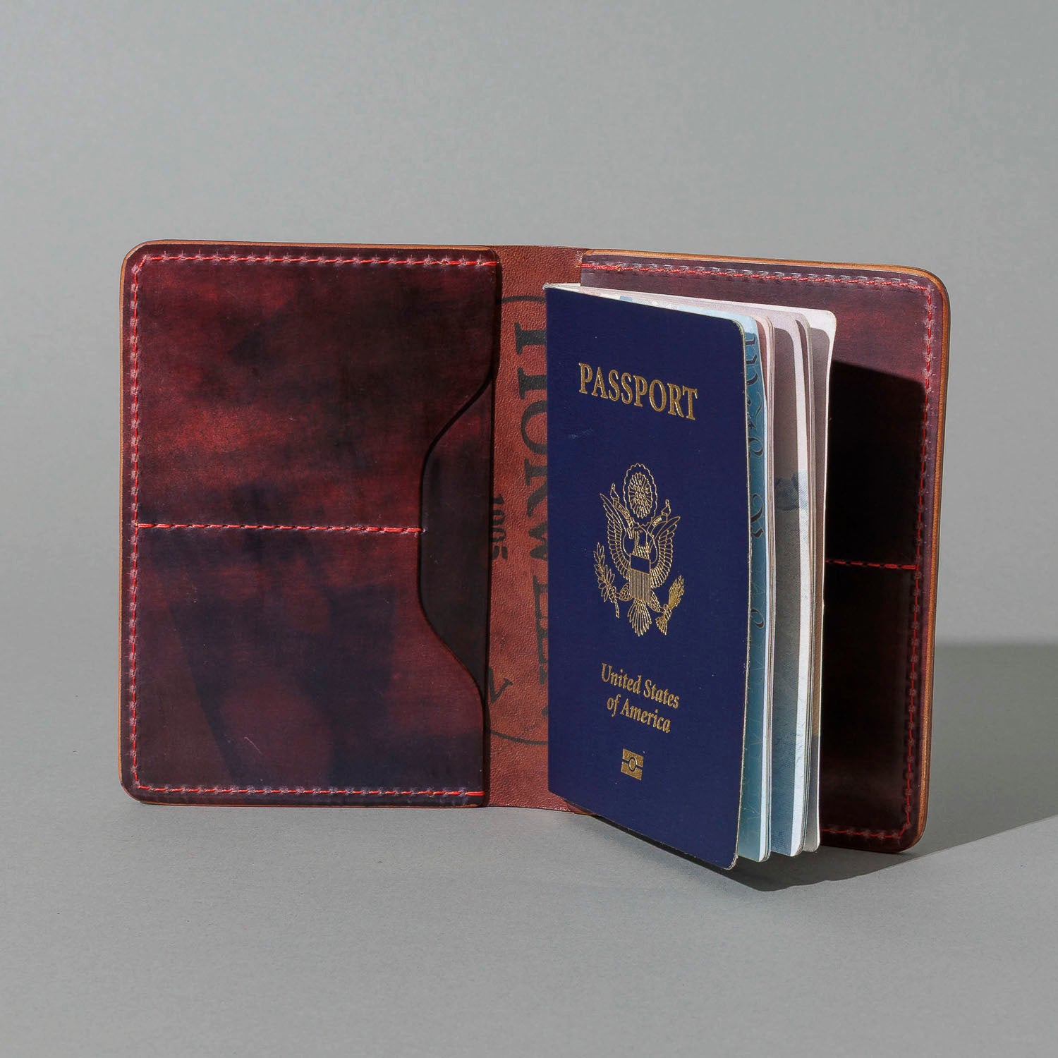 One-Off Traveler Passport Holder in Psychedelic Color 8 Shell Cordovan, No Bill Slot, open with a passport inside