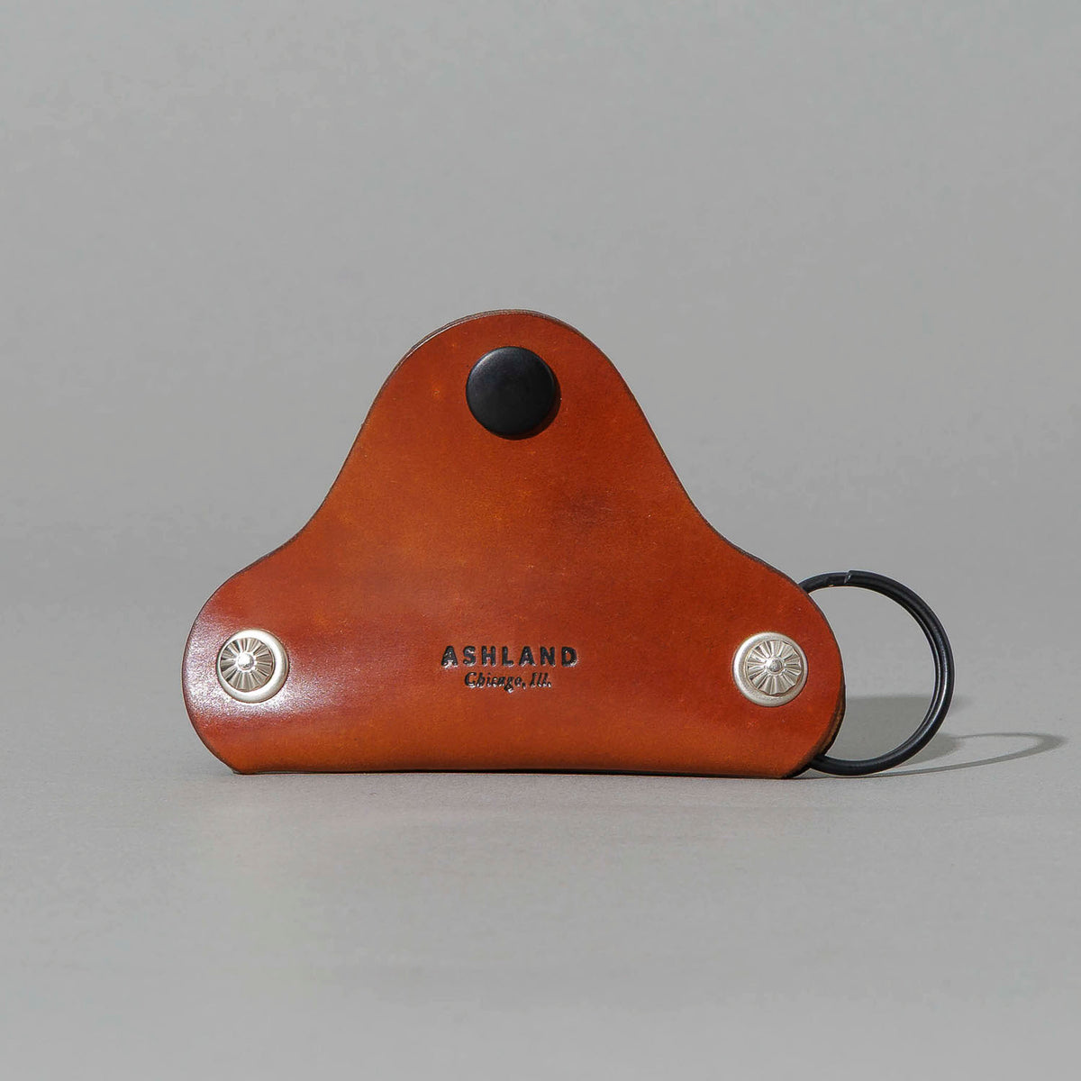 Vault Key Holder in Blood Orange Shell Cordovan, opened to show where keys sit, shot 2