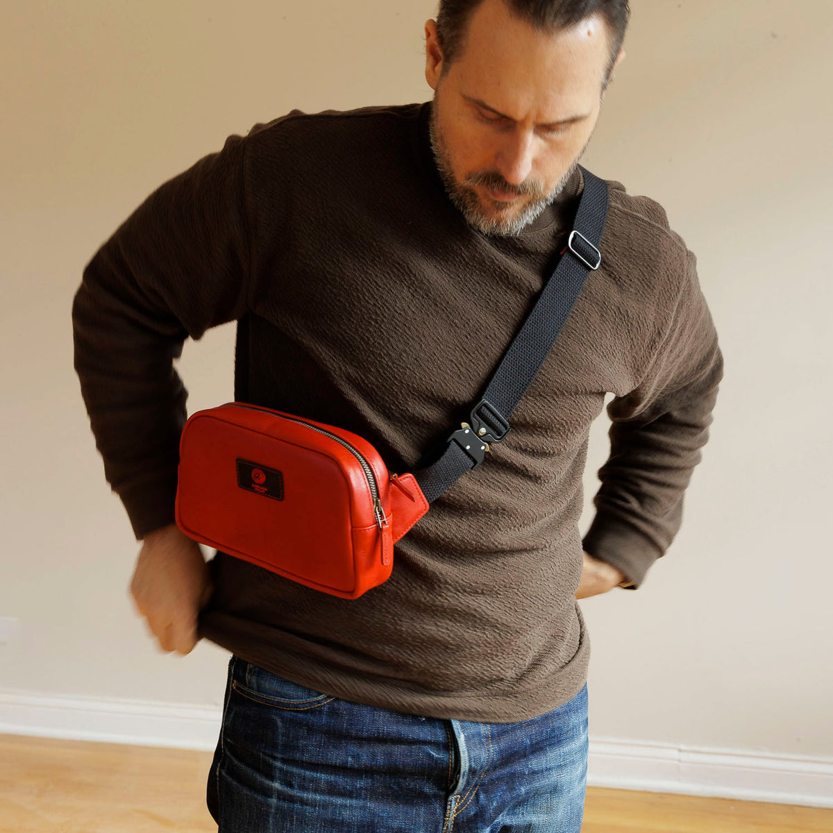 One-Off Sling Bag in Red Latigo, worn crossbody by a model, shot 4