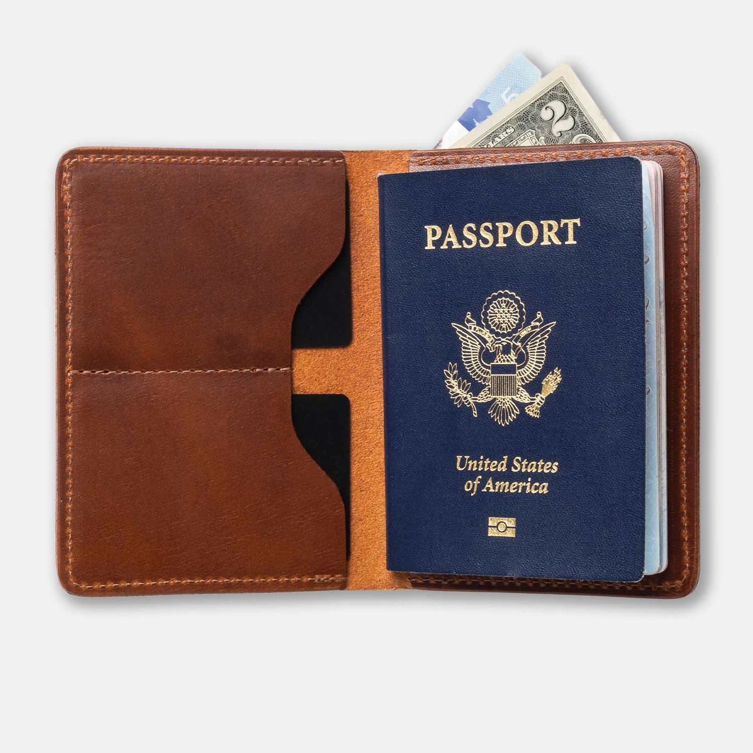 Brown leather passport holder with a US passport and money on a white background