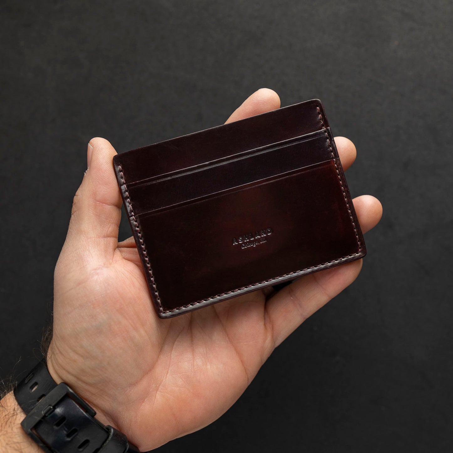 ashland leather shell cordovan wallet in hand