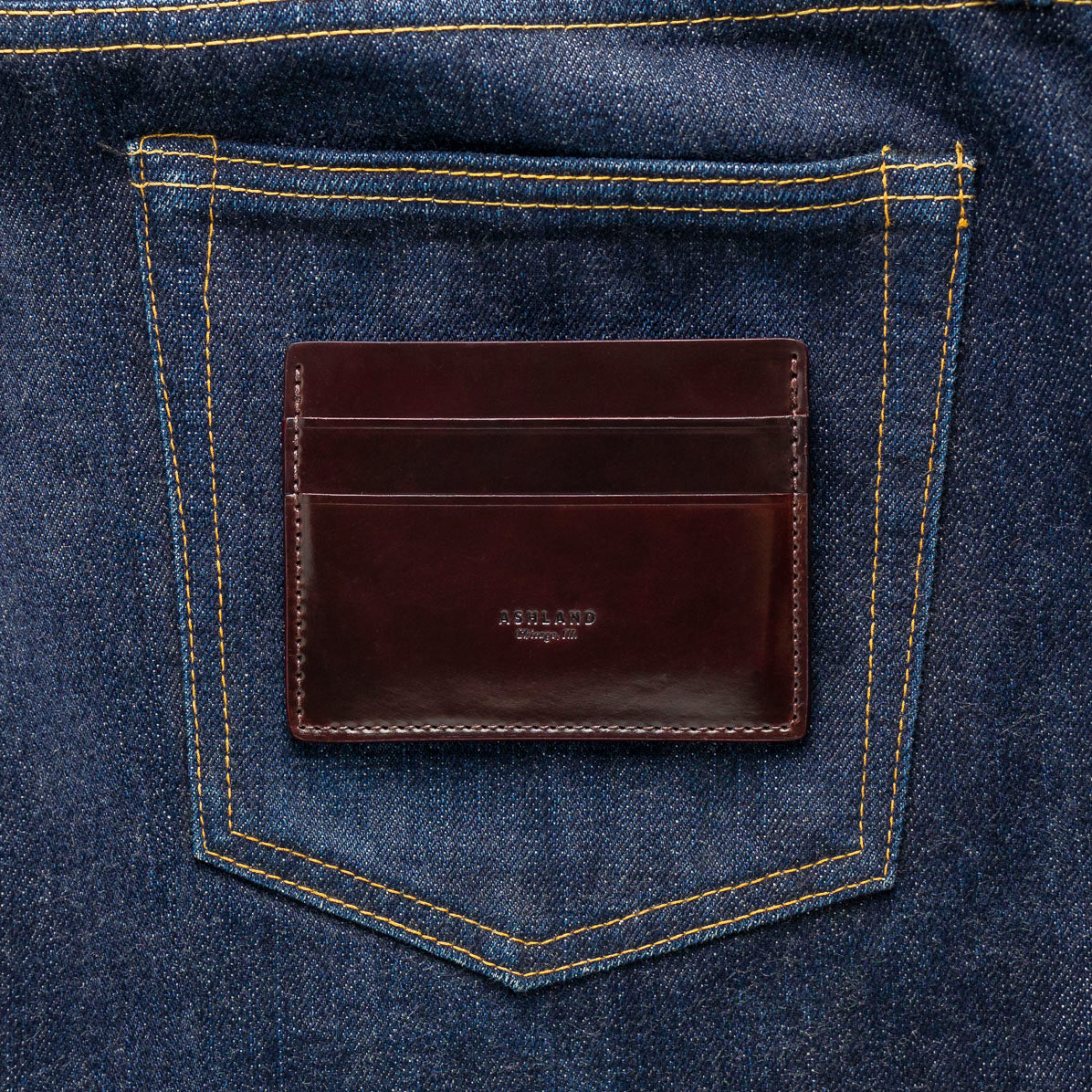 shell cordovan leather wallet on jeans