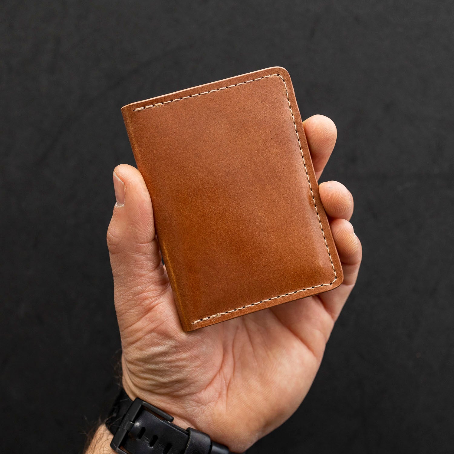 hand holding shell cordovan bugs moran card holder wallet