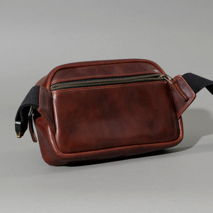 Sling Bag in Horween® Chromexcel® Brown Wooly horsehide, back view showing the exterior pocket
