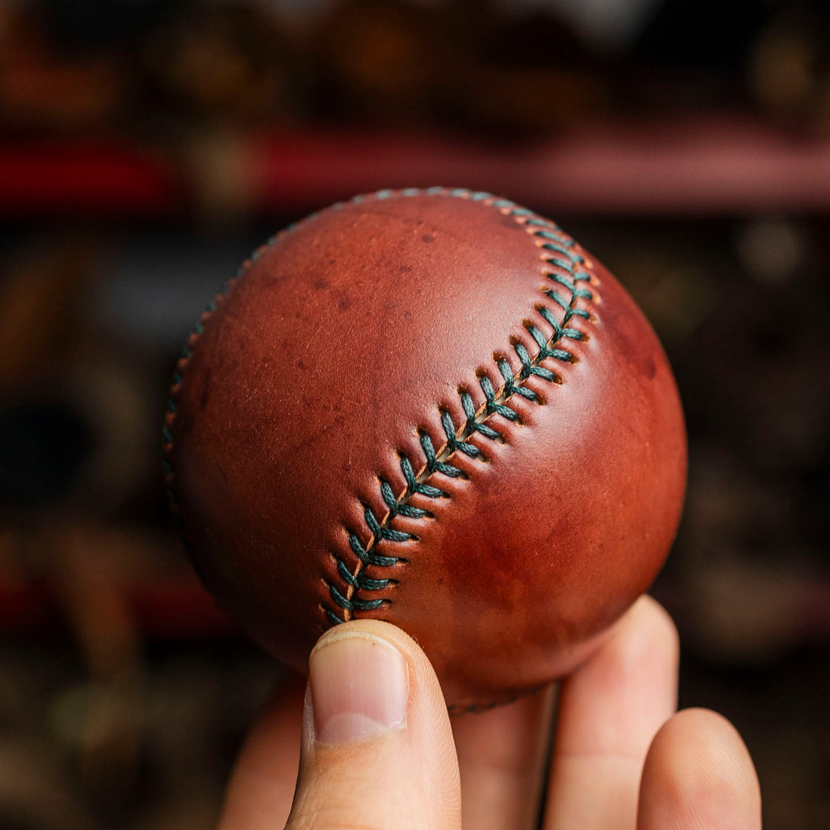 closeup on a white baseball ball with red thread, black background Stock  Photo