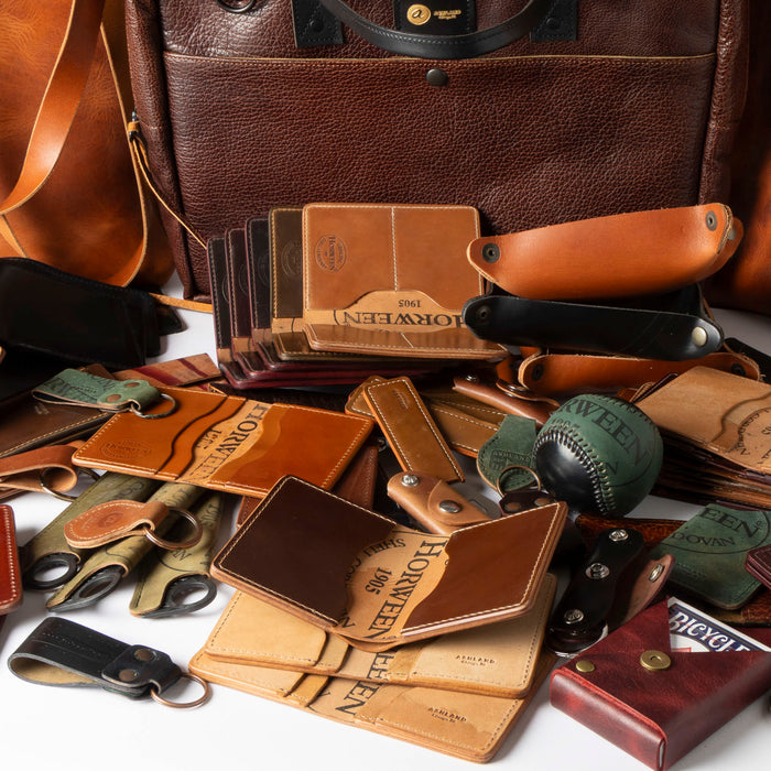 Assortment of Ashland leather wallets, bags, and accessories