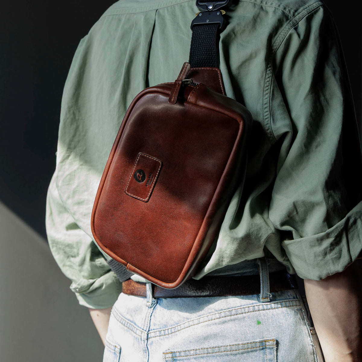 Sling Bag in Horween® Chromexcel® Brown Wooly horsehide, worn crossbody on the back