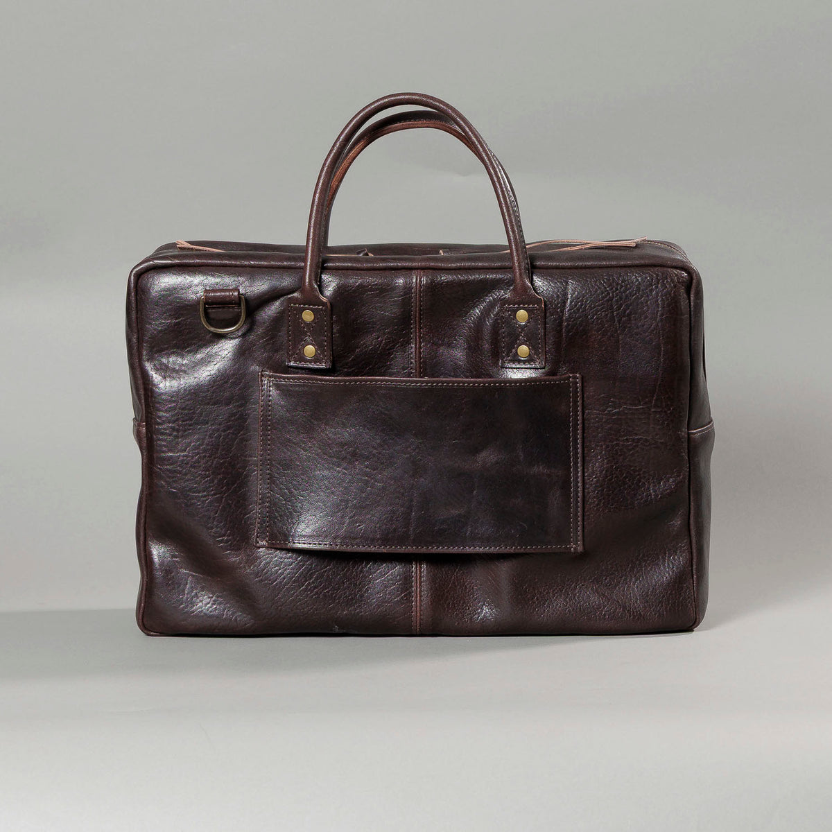 One-off LaSalle Briefcase in Horween® Epic Color 8 Aspen Horsehide, back view with luggage pass-through sleeve
