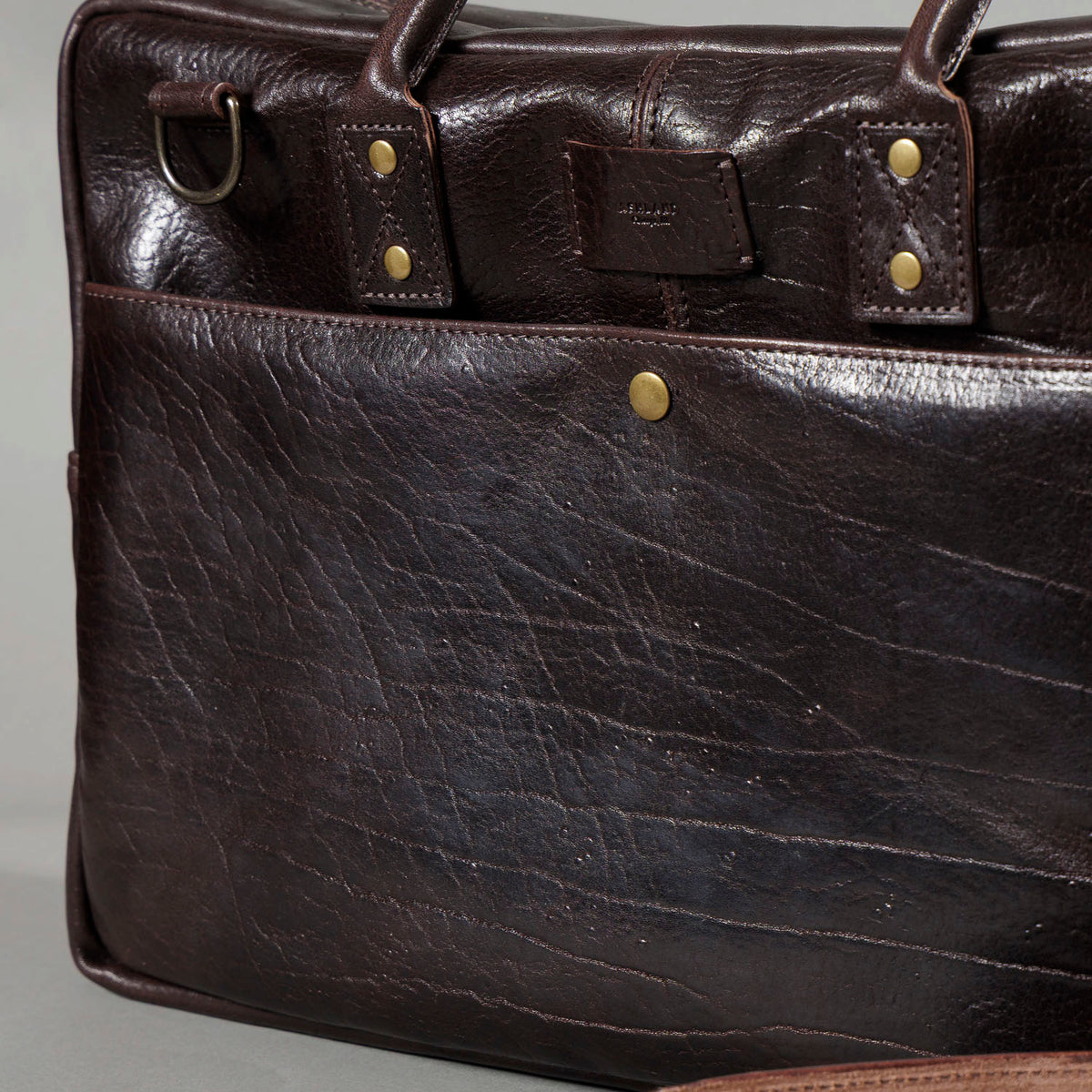 One-off LaSalle Briefcase in Horween® Epic Color 8 Aspen Horsehide, front quick-access pocket close-up