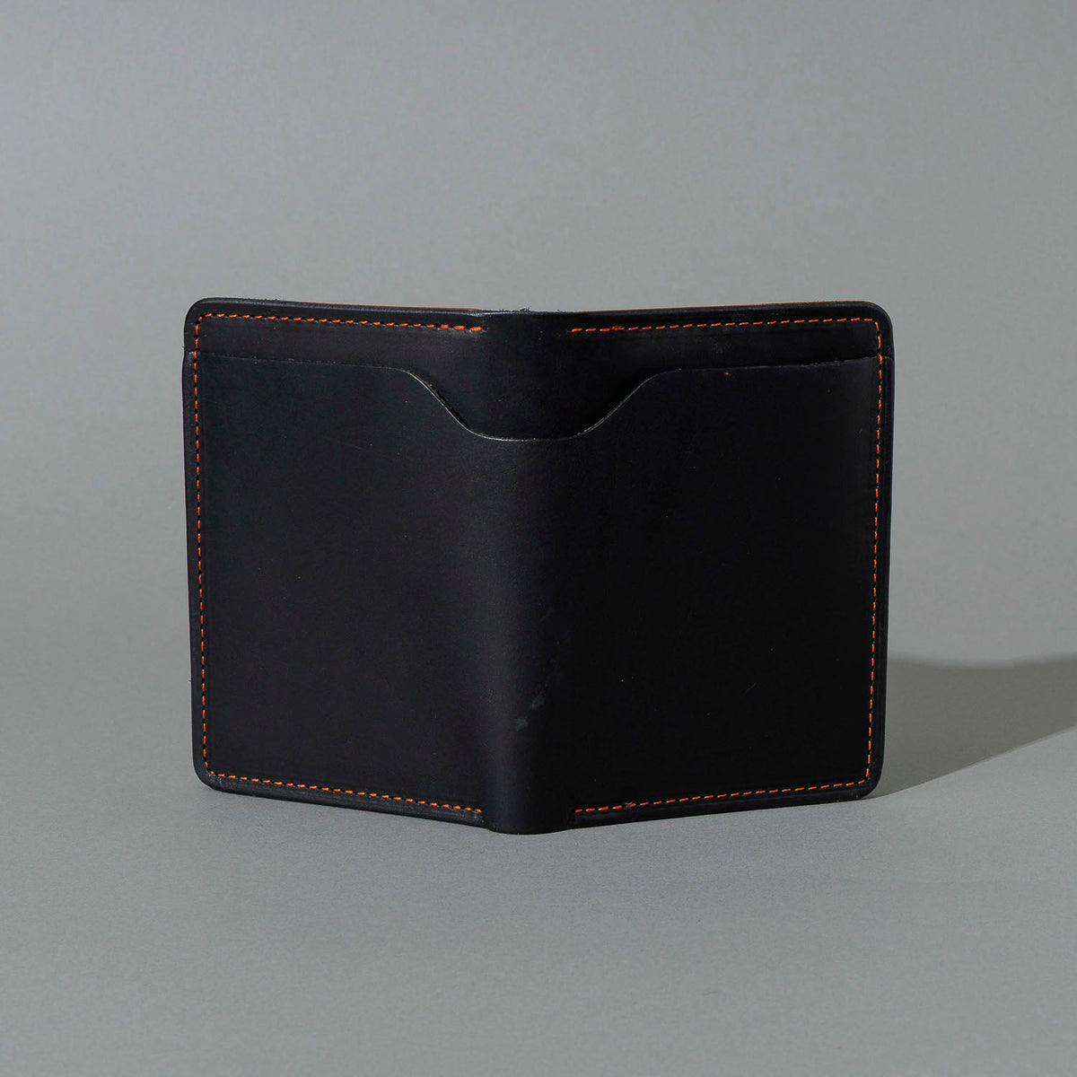 B-Grade One-Off Fat Herbie in Black Dublin & Orange Latigo, Two Hidden Card Slots, front view