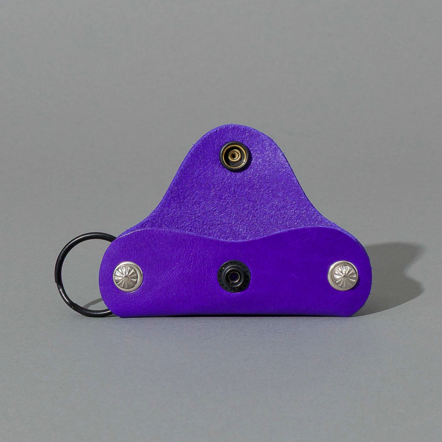 Vault Key Holder in Violet Latigo, opened to show where keys sit, shot 1