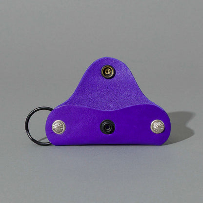 Vault Key Holder in Violet Latigo, opened to show where keys sit, shot 1