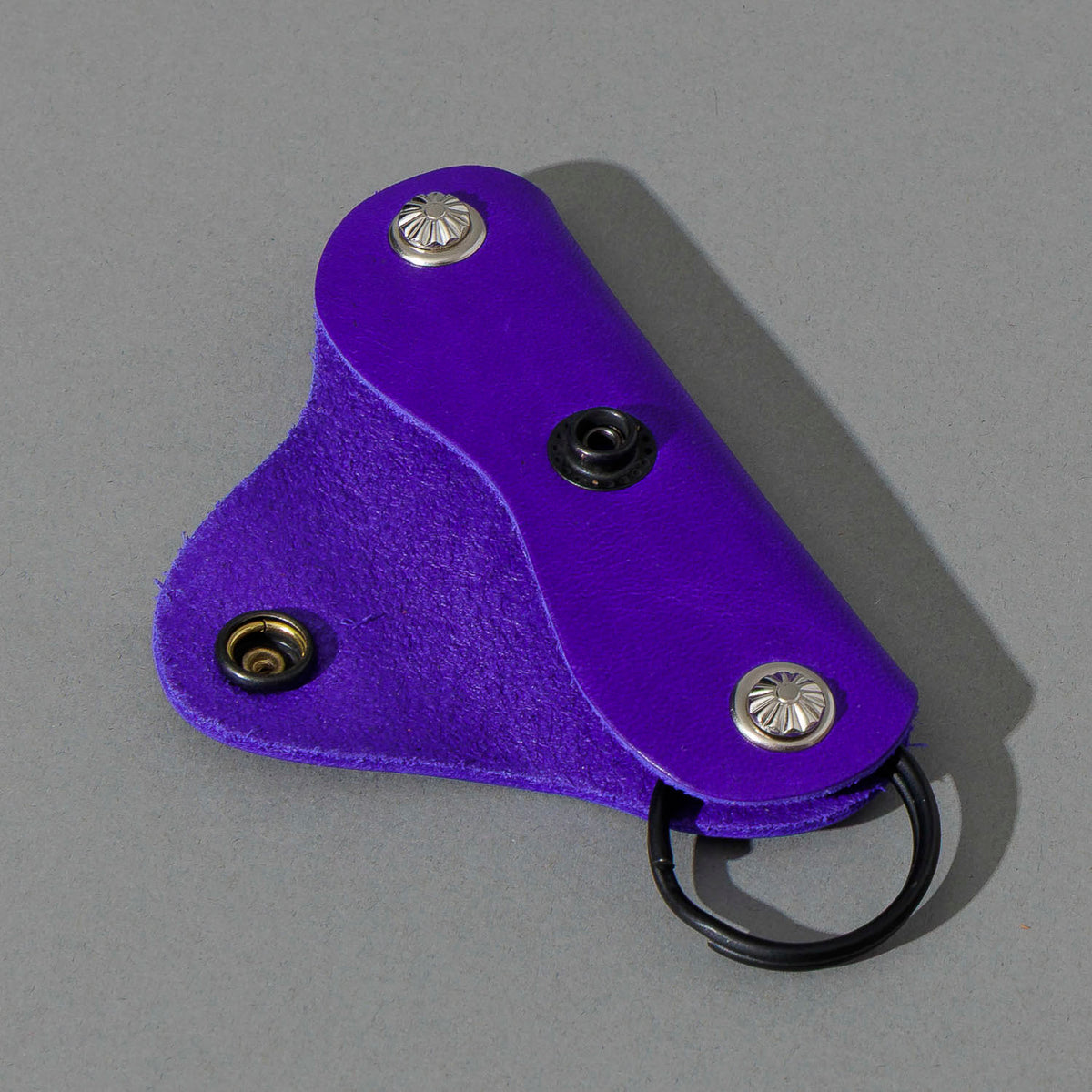 Vault Key Holder in Violet Latigo, opened to show where keys sit, shot 2