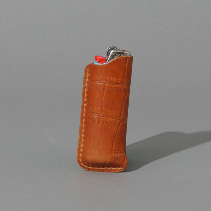 BIC Lighter and Sheath in Gator Amaretto Shell Cordovan, standing upright, side angle, shot 2