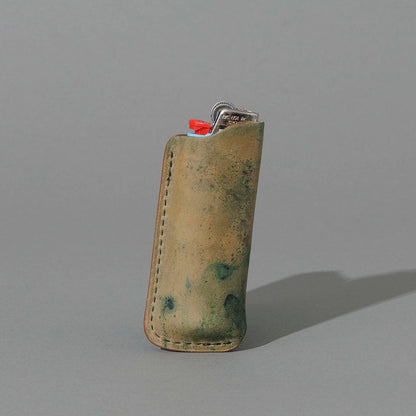 One-Off BIC Lighter and Sheath in Reverse Blue Shell Cordovan, standing upright, side angle, shot 2