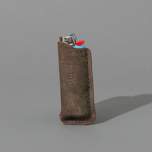 One-Off BIC Lighter and Sheath in Reverse Shell Cordovan, standing upright, side angle, shot 1