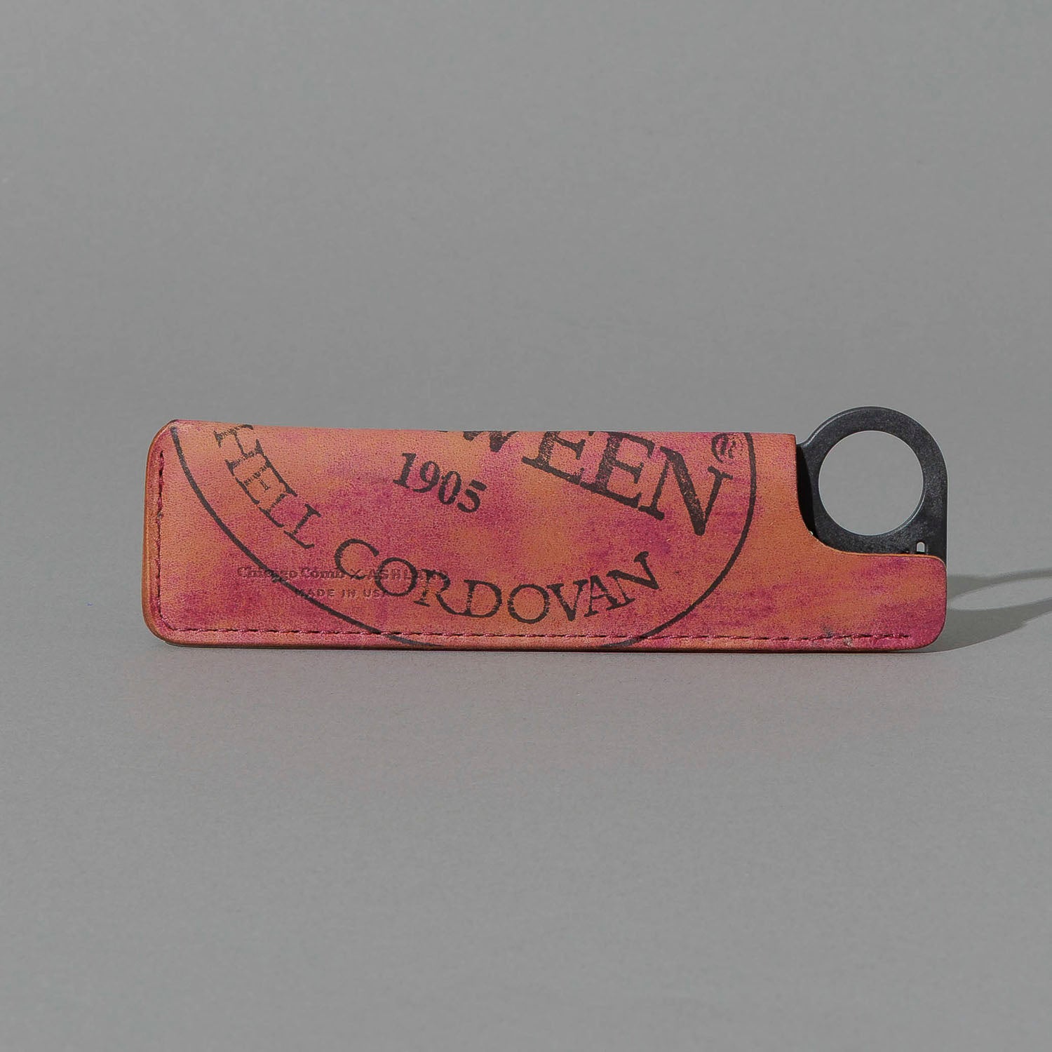 One-Off Chicago Comb and Leather Sheath in Reverse Ultraviolet Shell Cordovan, front view