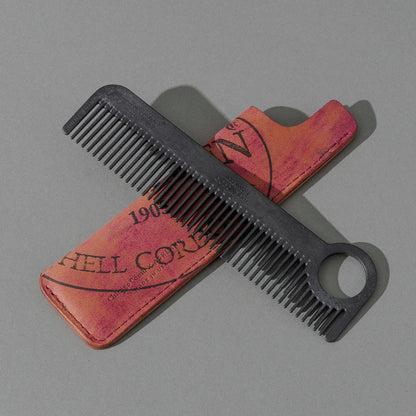 Chicago Comb and Leather Sheath in Reverse Ultraviolet Shell Cordovan, with a black Chicago Comb crossed over the sheath
