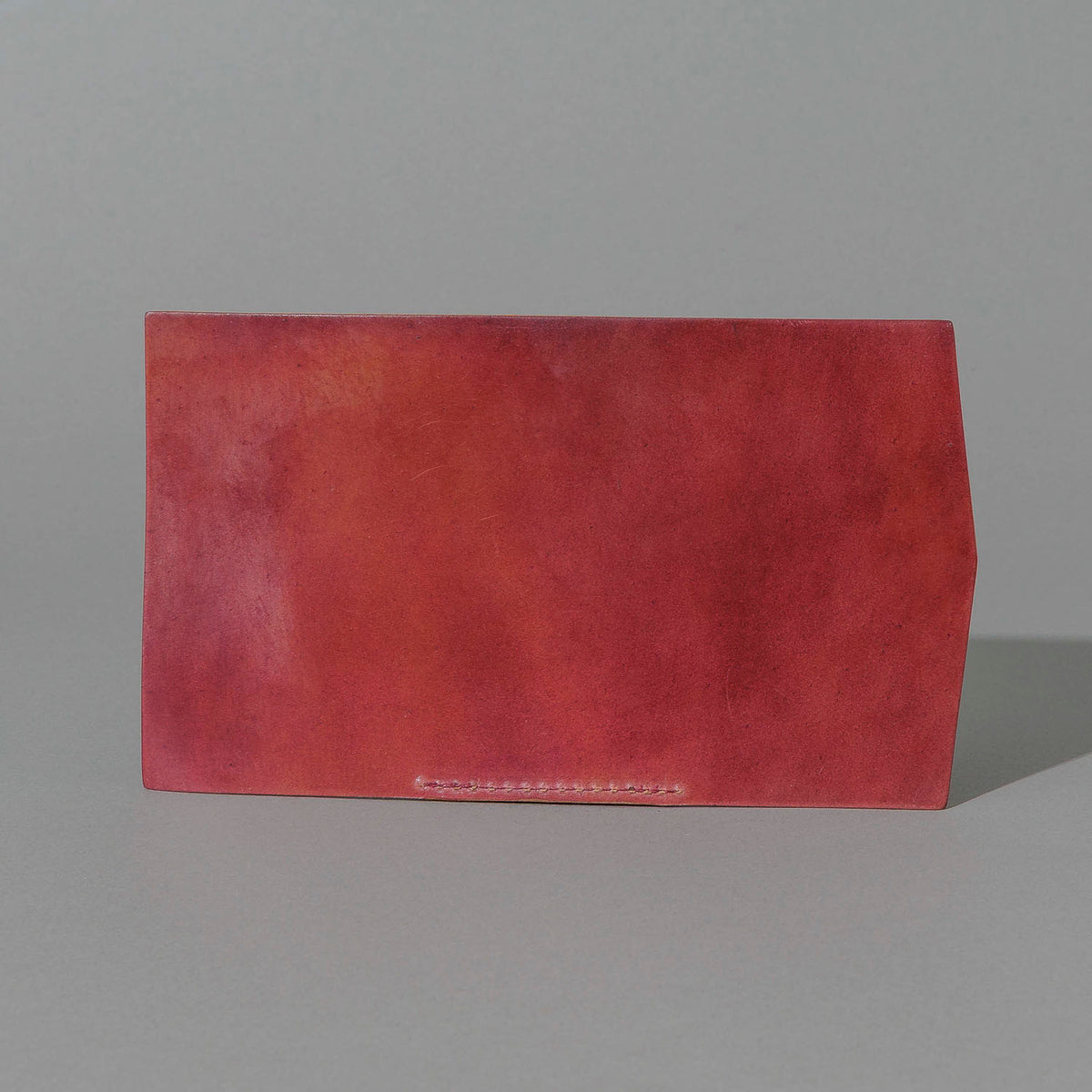 One-Off Jr. Fold in Marbled Ultraviolet Shell Cordovan, unfolded to show the key mechanism