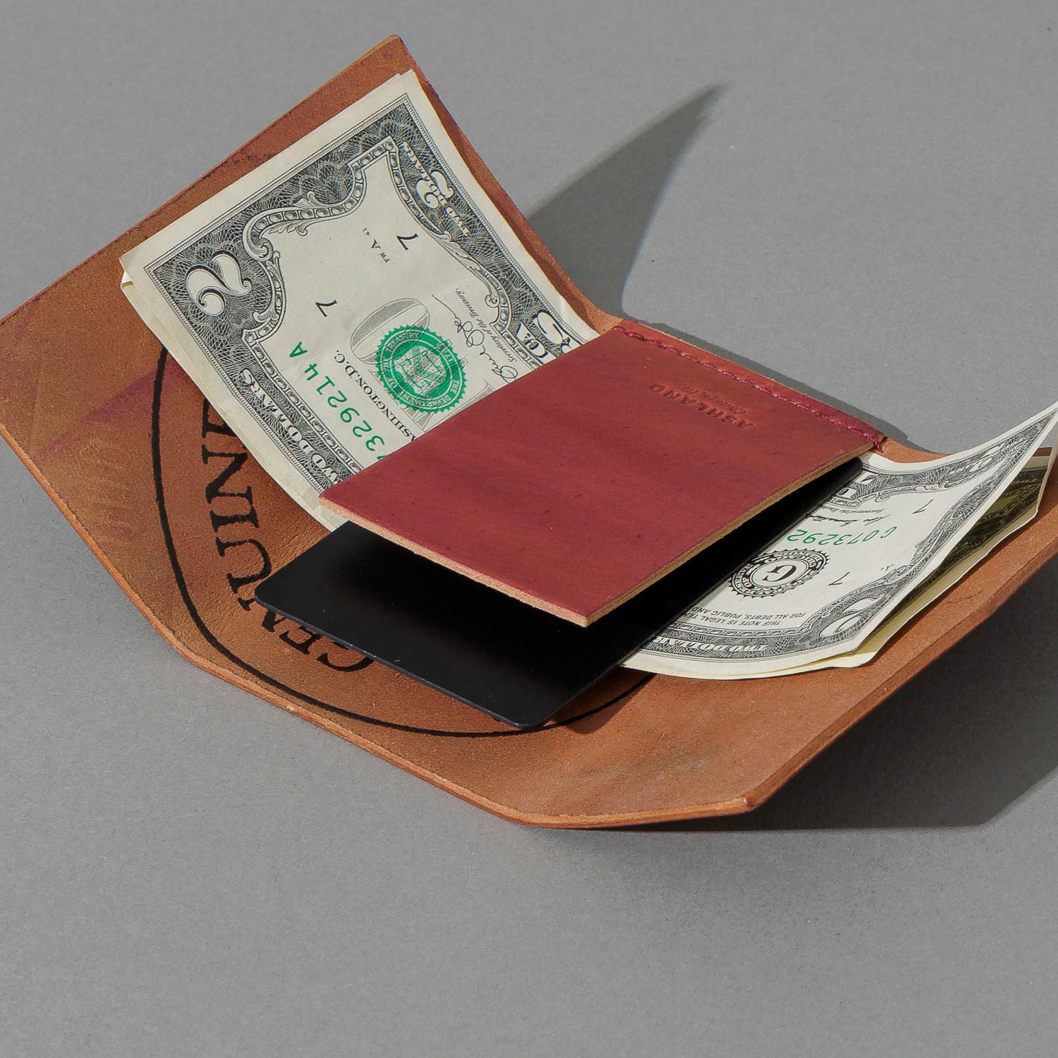 One-Off Jr. Fold in Marbled Ultraviolet Shell Cordovan, open with cash and cards, shot 2