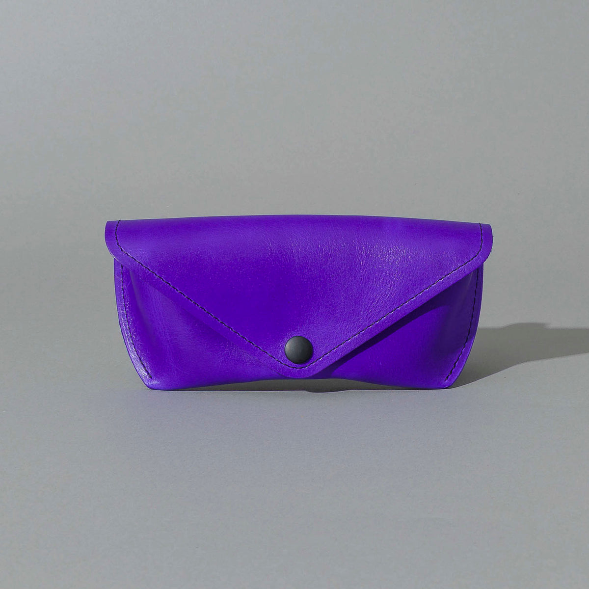 Glasses Case in Violet Latigo, front view