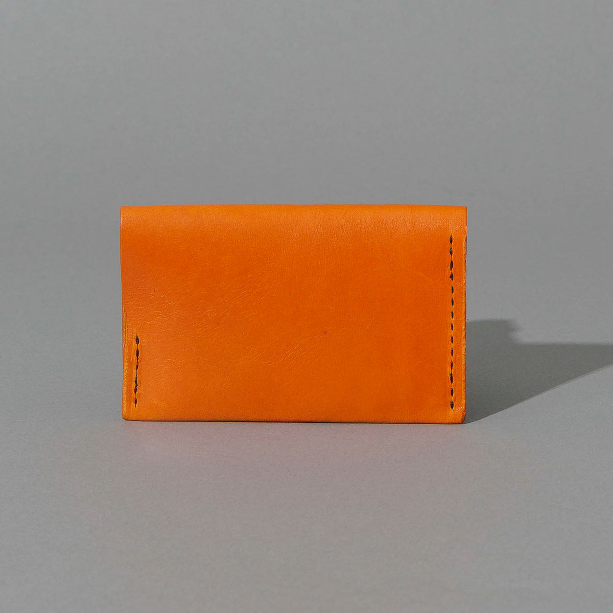 Machine Gun Jack in Orange Latigo, back view