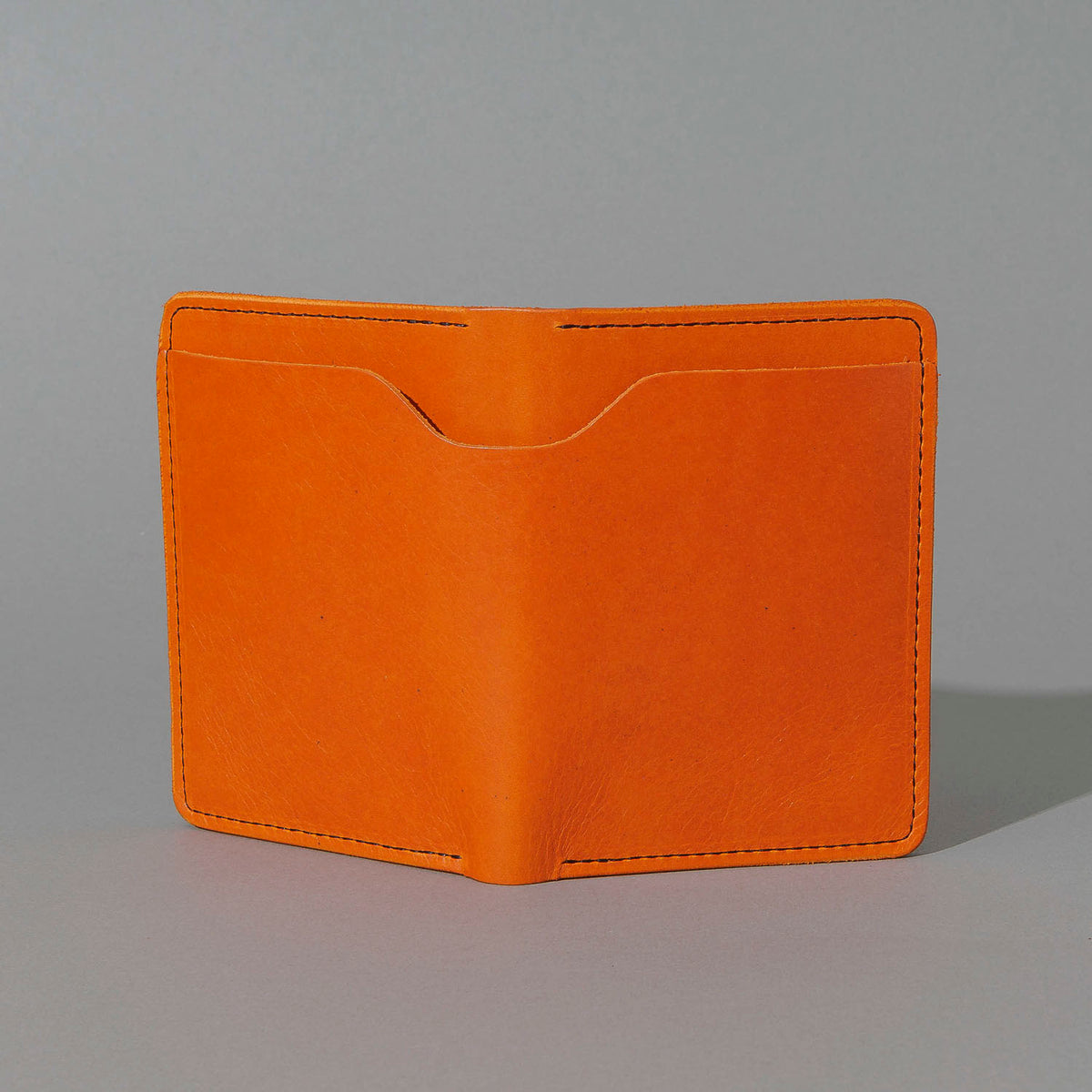 Fat Herbie in Orange Latigo, back view