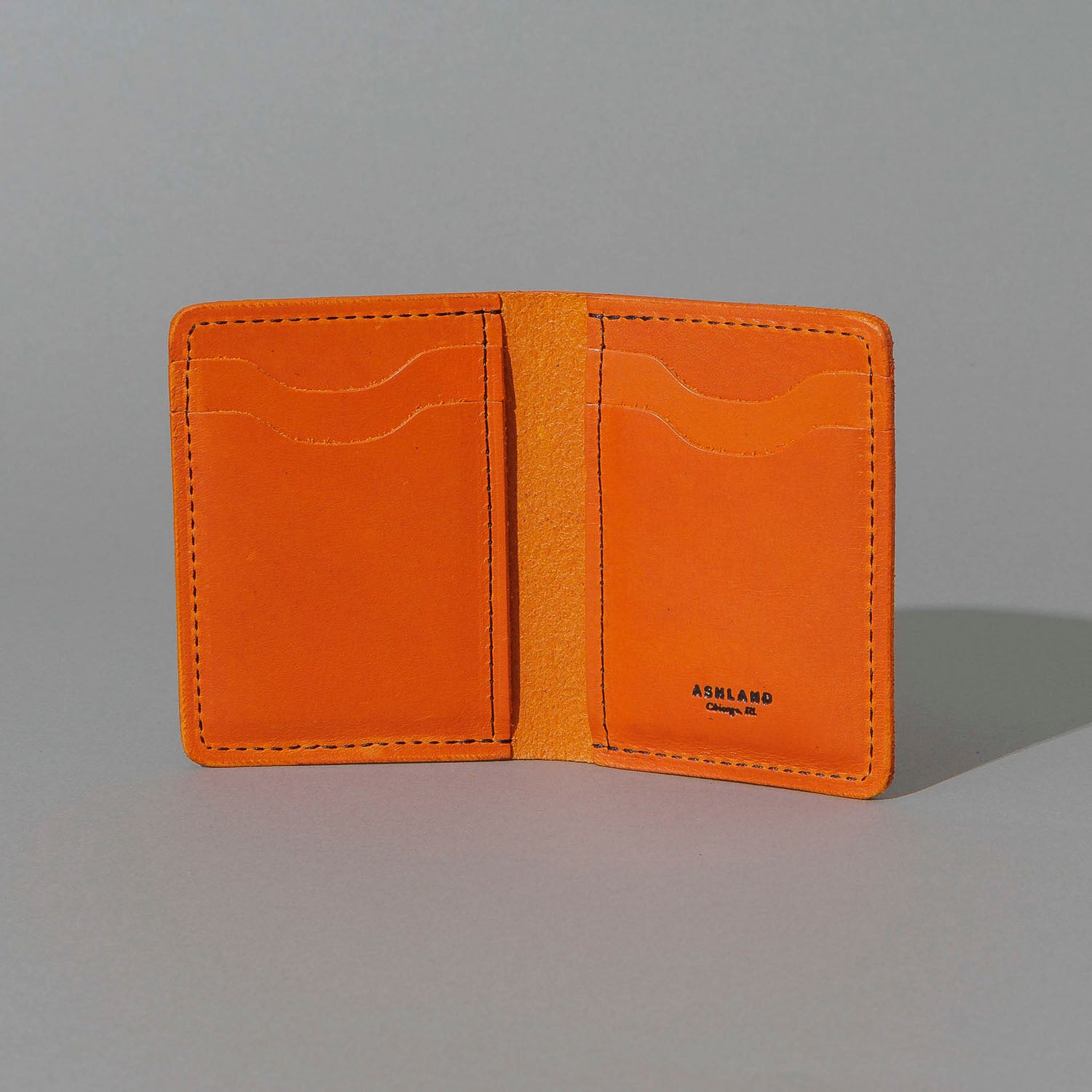 Vertical Bugs Moran in Orange Latigo, open, showing interior