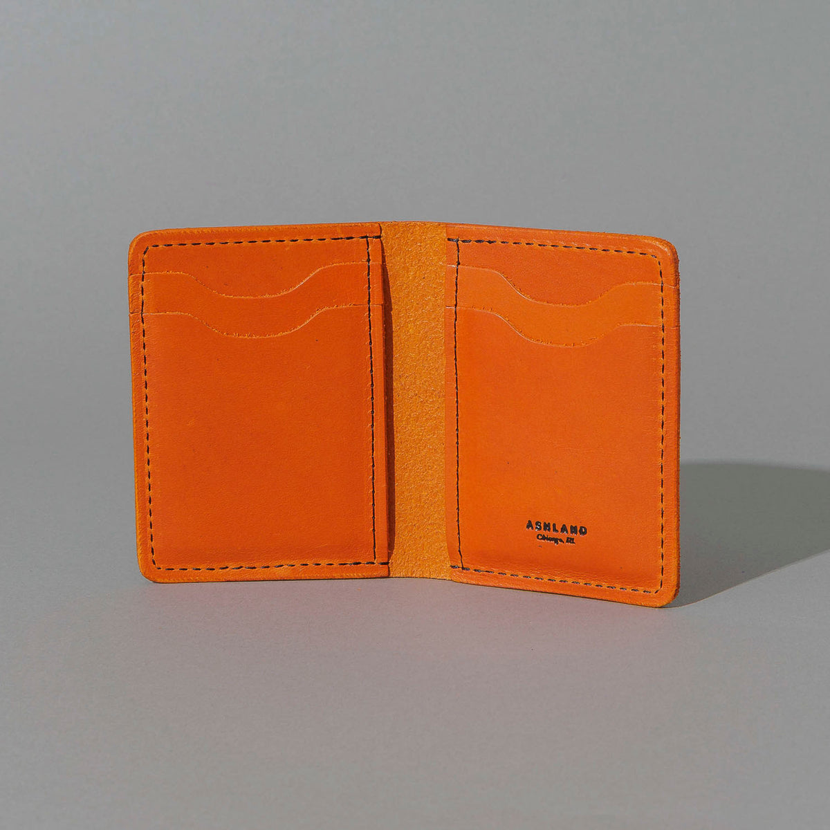 Vertical Bugs Moran in Orange Latigo, open, showing interior