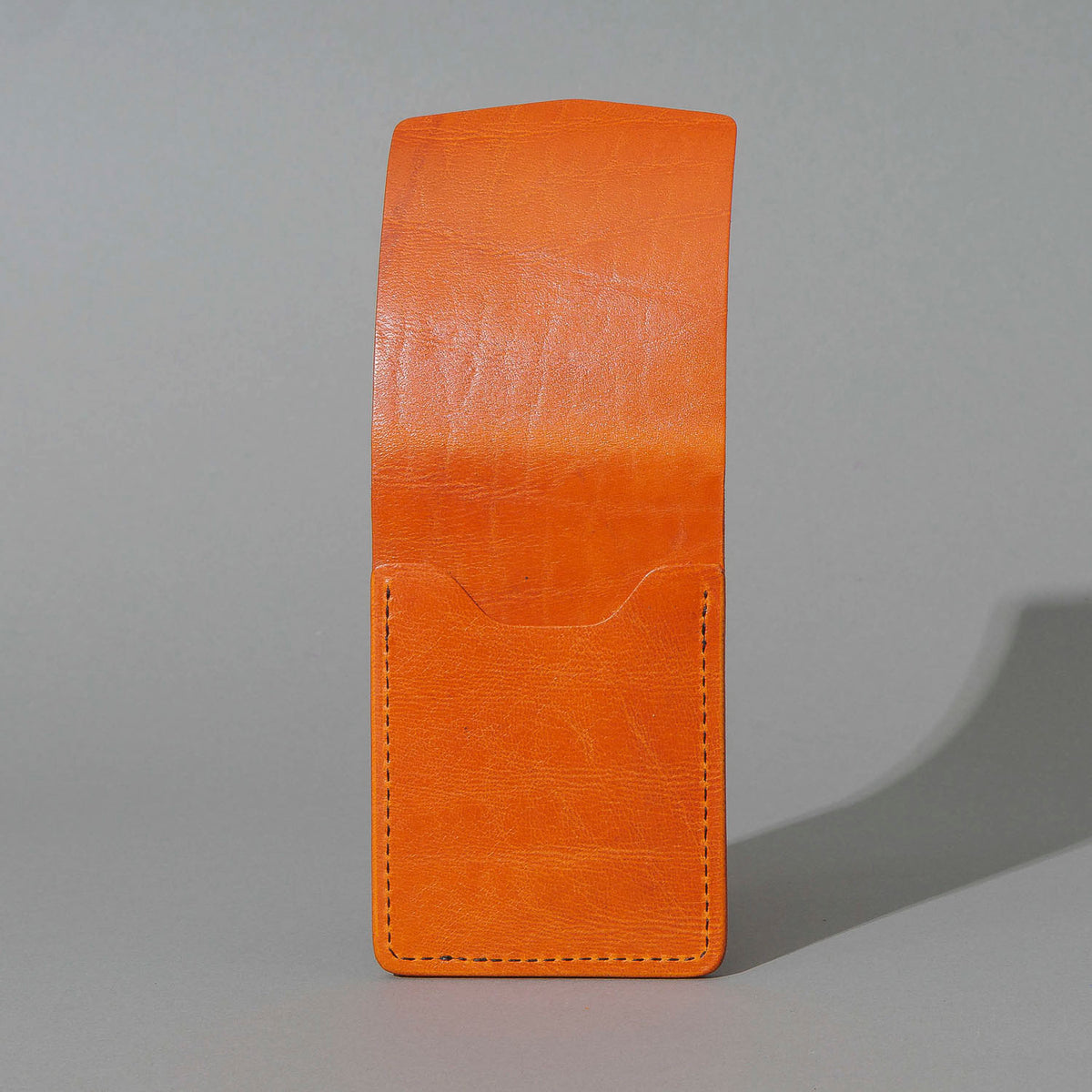 One-Off Lucky Wallet in Epic Orange Latigo, side profile view