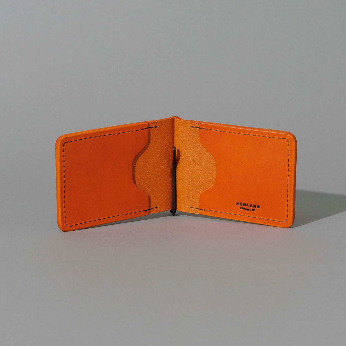 Capone Money Clip in Orange Latigo, open, showing interior