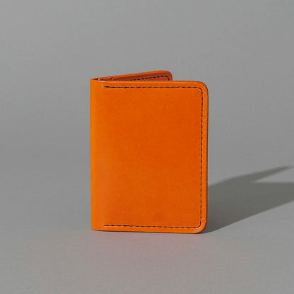 One-Off Six-Slot Bugs Moran Prototype in Orange Latigo, No Skip Stitch, standing upright, side angle, shot 1