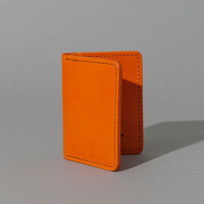 One-Off Six-Slot Bugs Moran Prototype in Orange Latigo, No Skip Stitch, standing upright, side angle, shot 2