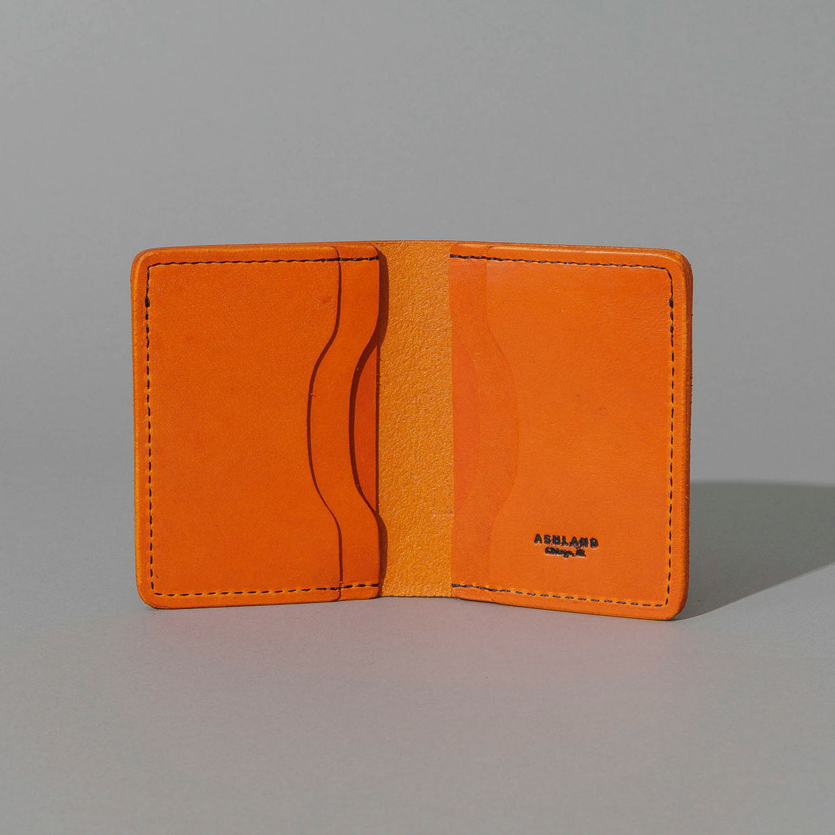 One-Off Six-Slot Bugs Moran Prototype in Orange Latigo, Skip Stitch, open, showing interior