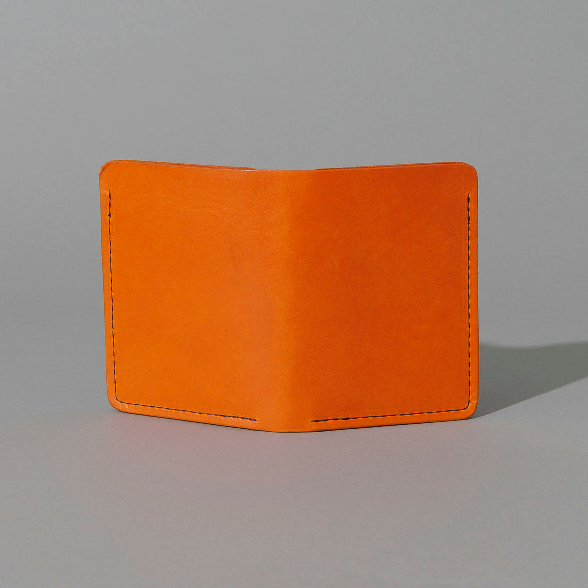 One-Off Six-Slot Bugs Moran Prototype in Orange Latigo, Skip Stitch, front view