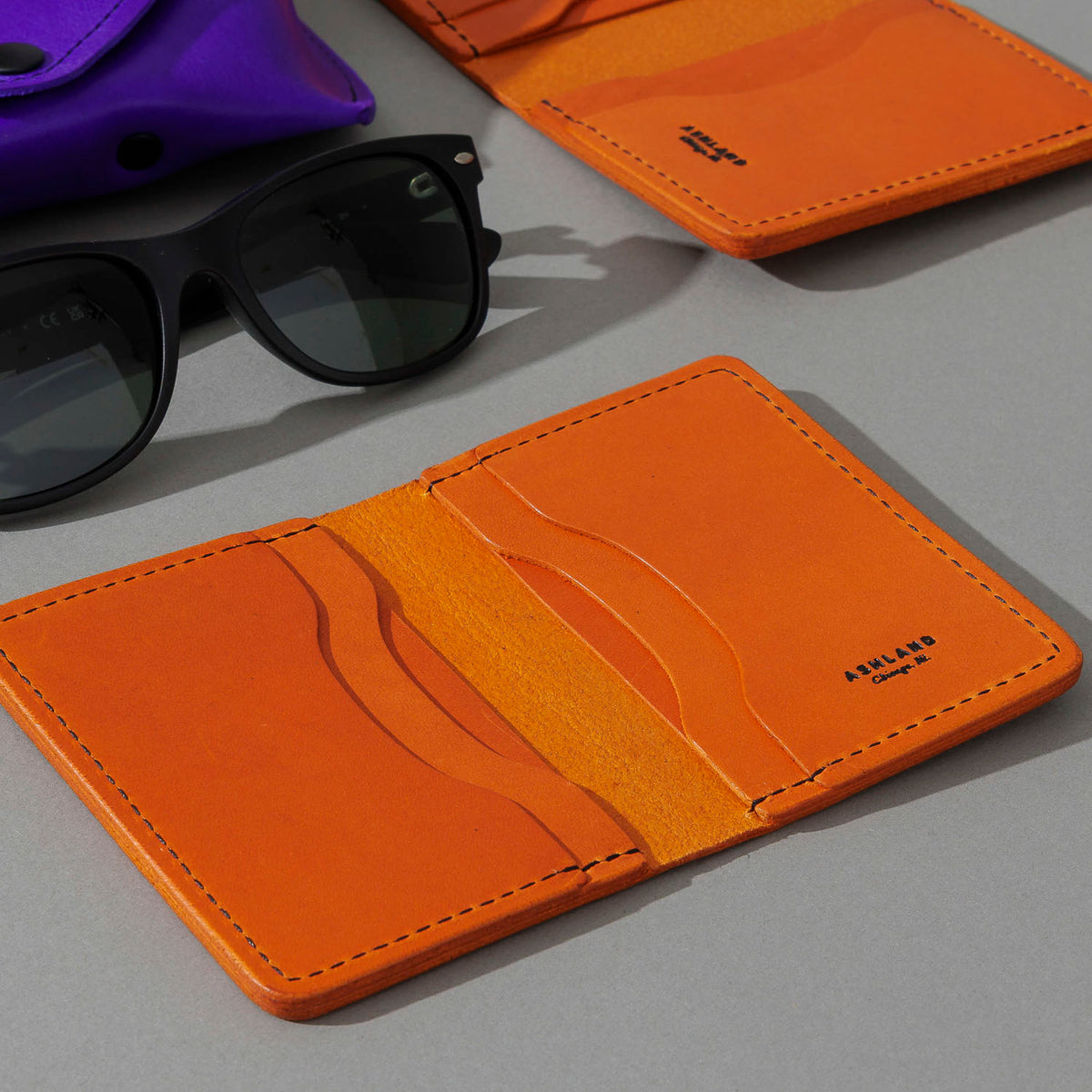 One-Off Six-Slot Bugs Moran Prototype in Orange Latigo, No Skip Stitch, group shot with other Fall Limited Release pieces