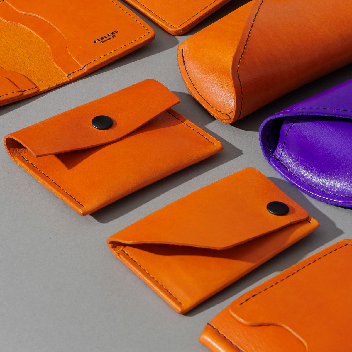 Machine Gun Jack in Orange Latigo, group shot with other Fall Limited Release pieces