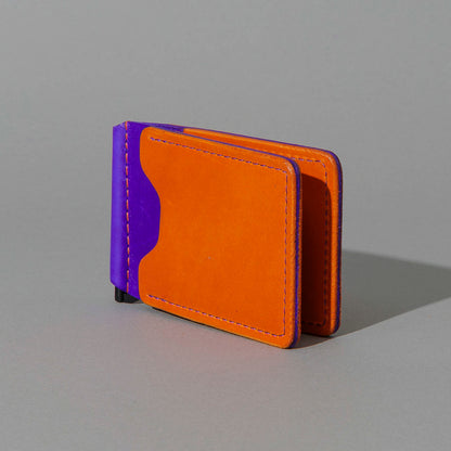 One-Off Capone Money Clip in Orange on Violet Latigo, standing upright, side angle
