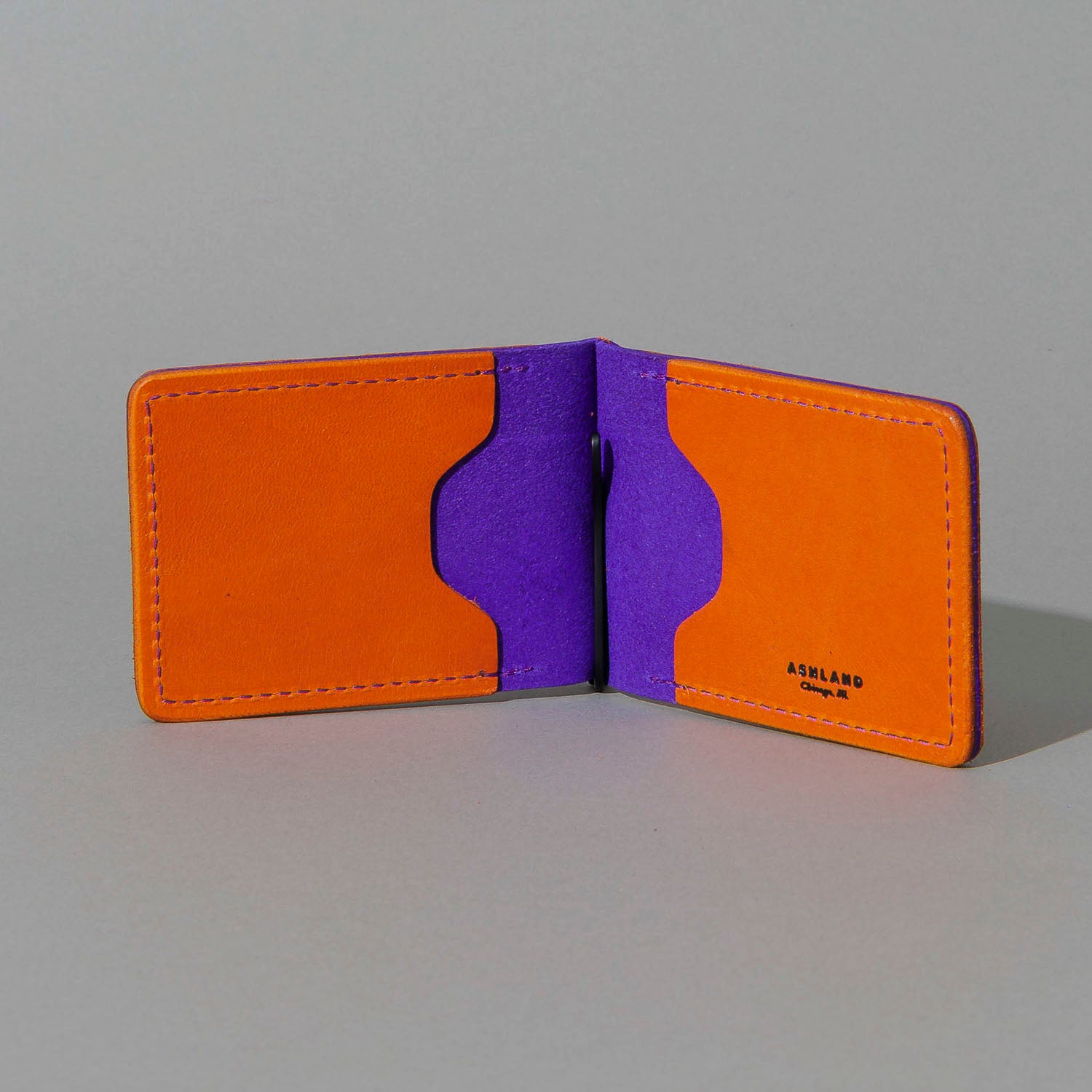 One-Off Capone Money Clip in Orange on Violet Latigo, open, showing interior, shot 1