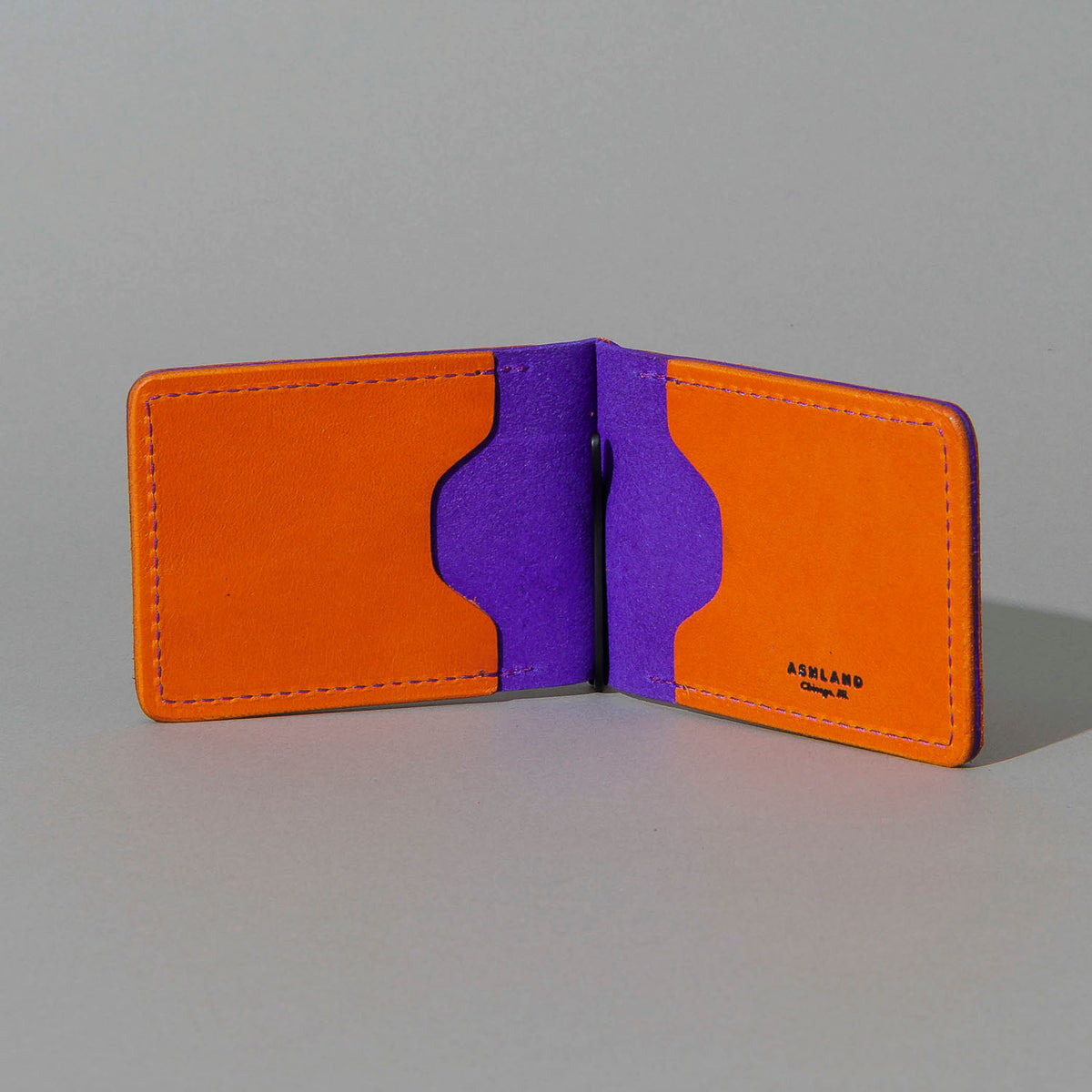 One-Off Capone Money Clip in Orange on Violet Latigo, open, showing interior, shot 1