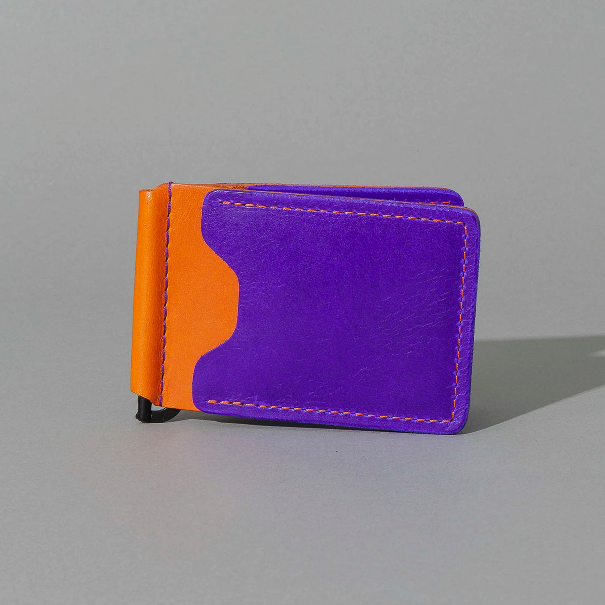 One-Off Capone Money Clip in Violet on Orange Latigo, front view, shot 1