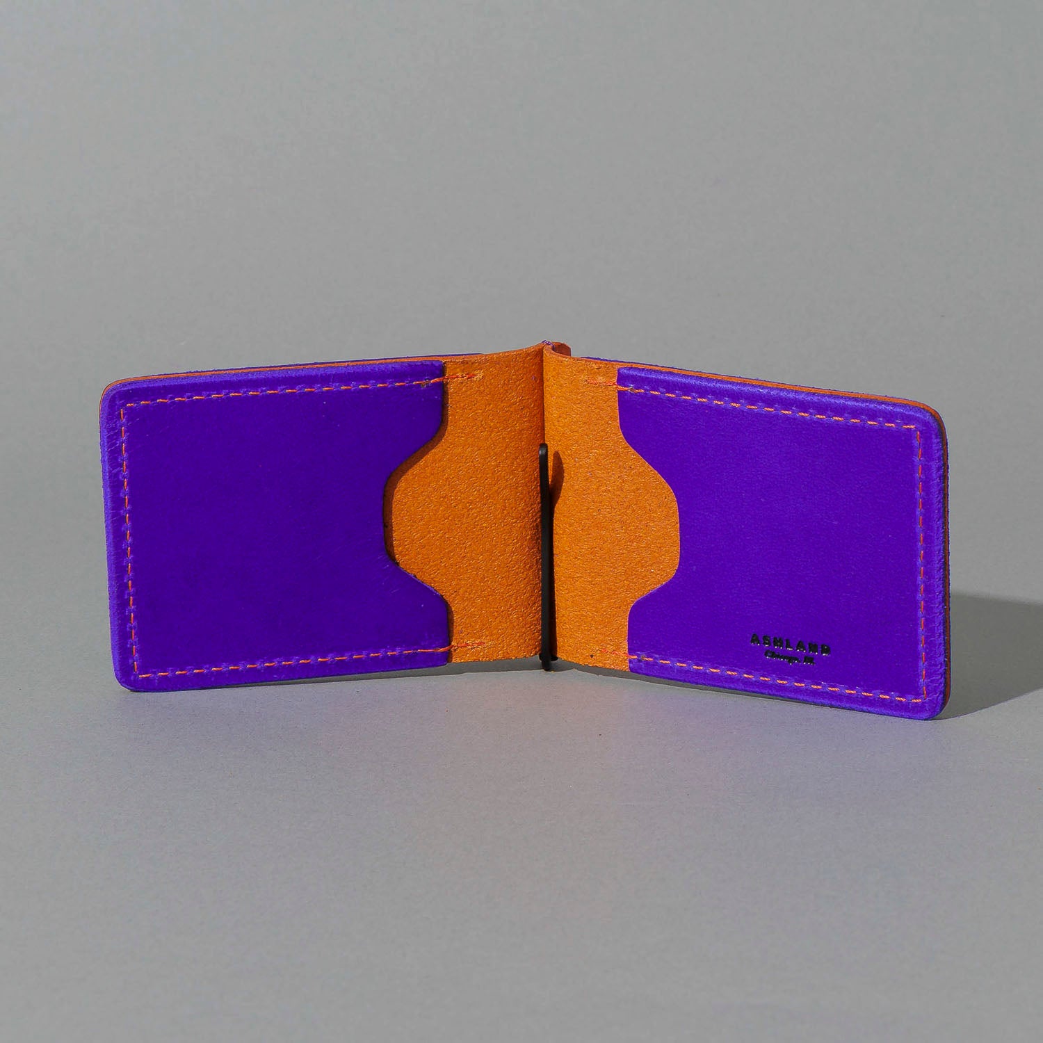One-Off Capone Money Clip in Violet on Orange Latigo, open, showing interior, shot 1