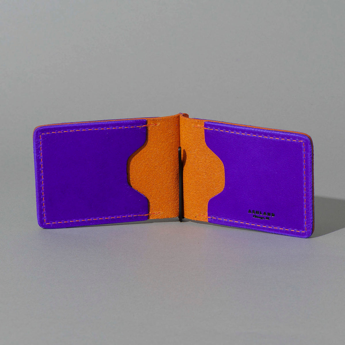 One-Off Capone Money Clip in Violet on Orange Latigo, open, showing interior, shot 1