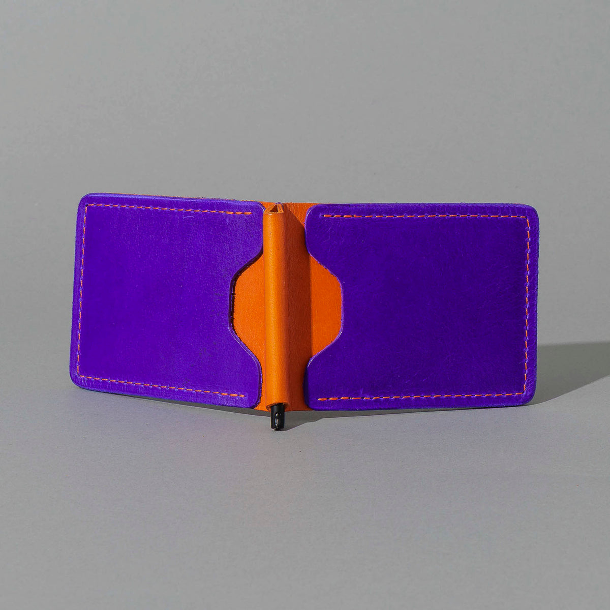 One-Off Capone Money Clip in Violet on Orange Latigo, open, showing interior, shot 2