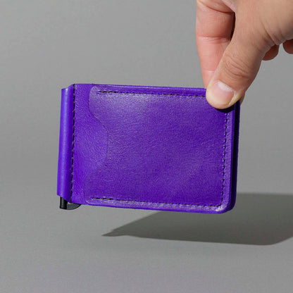 Capone Money Clip in Violet Latigo, held in hand, shot 3