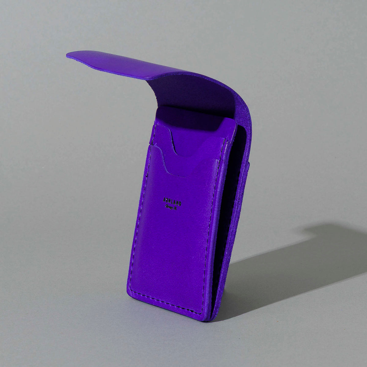 Lucky Wallet in Violet Latigo, side profile view